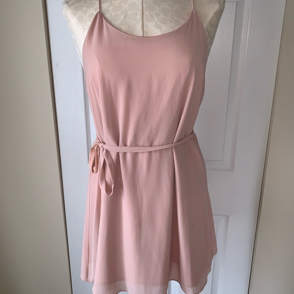 Pale pink strappy dress with tie at waist line
